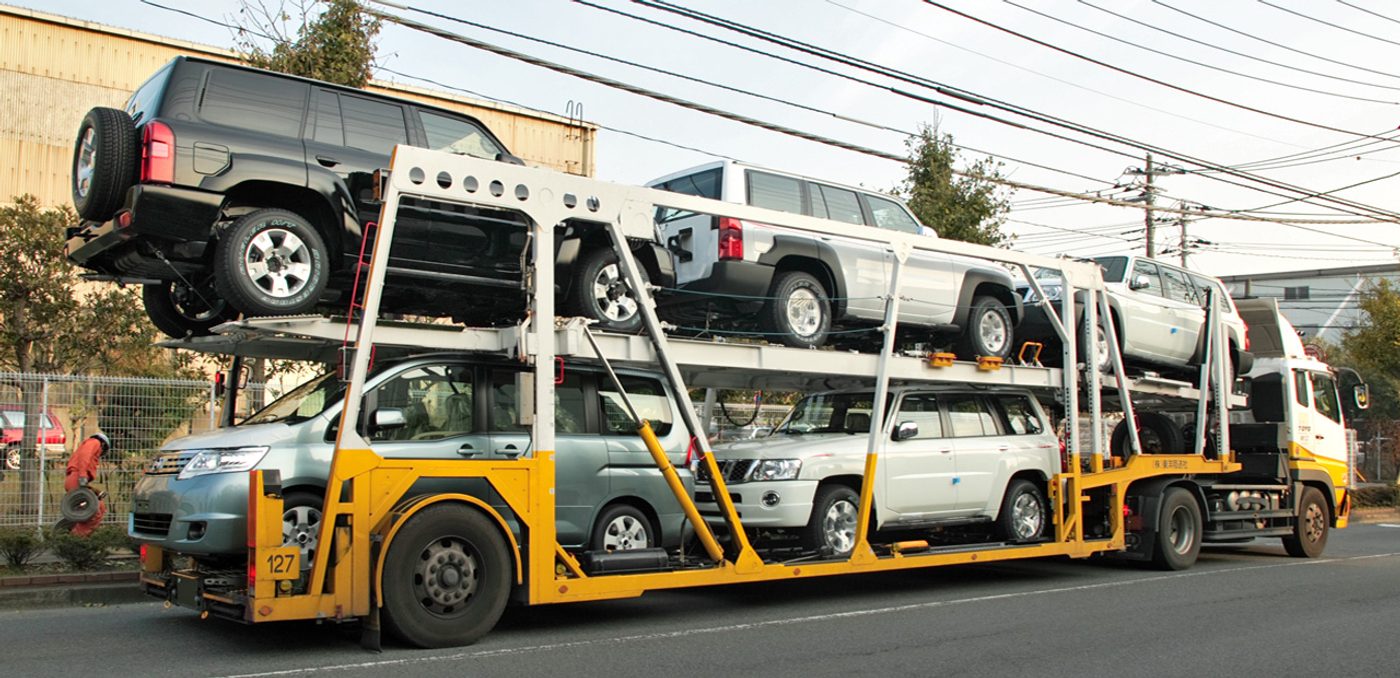 An open multi-car transport trailer